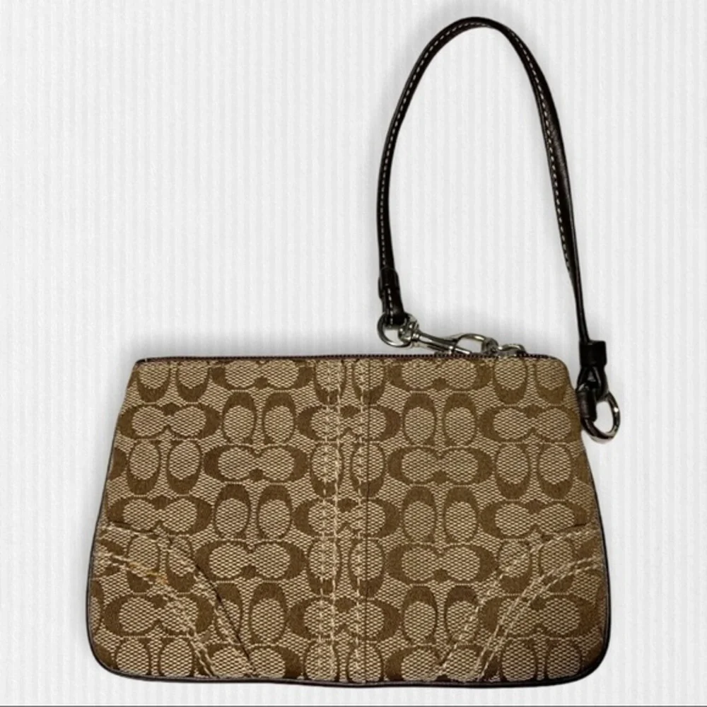 Signature Coach Wristlet - Picture 11 of 17